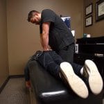 Chiropractor treats a work place injury patient in omaha