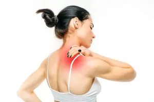 woman holding her neck due to inflammation 