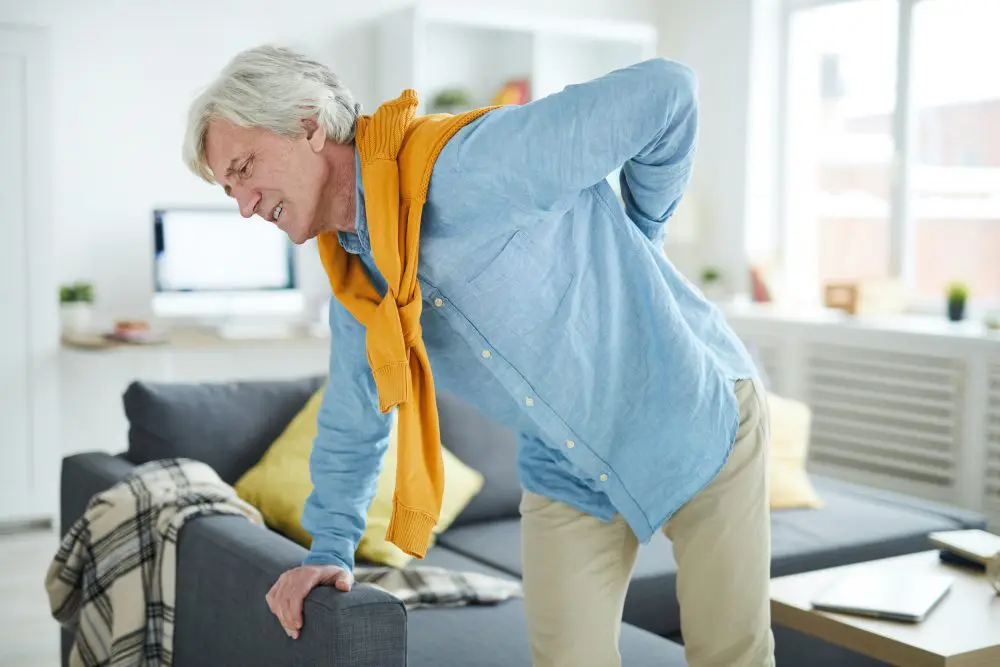 elderly man having back pain