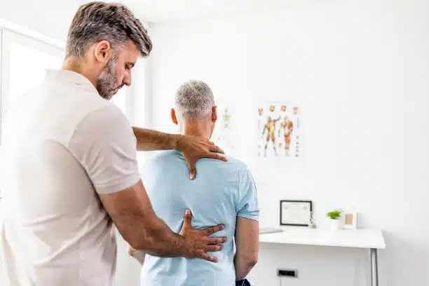 doctor performing chiropractic adjustment to the patient